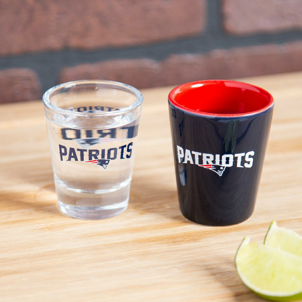 New England Patriots 4-Piece Ceramic and Glass 2oz. Shot Glass Set